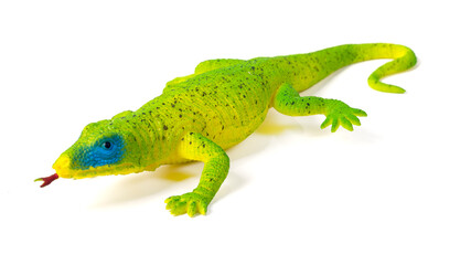 Plastic house lizard toy isolated on white background