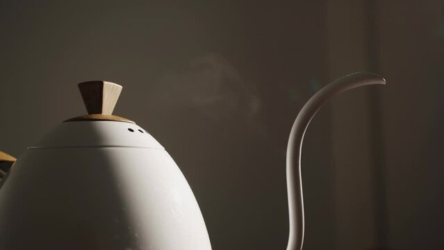 Steam coming out of boiling kettle