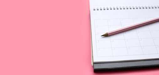 Pencil on calendar.  Work planning