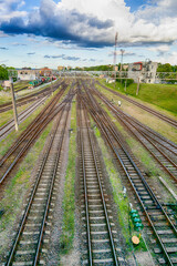 Fototapeta na wymiar Multiple Railway Station with Wagons During Daytime From Upper Point