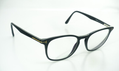 black frame glasses on white background