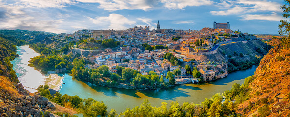 Amazing View of Medieval Center of Toledo City in Spain With Tejo River, Cathedral and Alcazar of Toledo. - obrazy, fototapety, plakaty