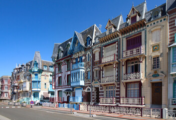Fototapeta na wymiar Famous facades on the seaside of Mers-les-Bains, limit of Hauts-de-France and Normandy. France