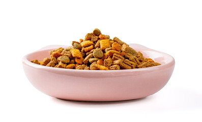 Porcelain bowl with dry cat food on a white background close-up