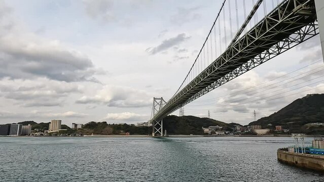 view over the bay and Kanmon bridge and the kanmon strait in between the japanese island Honshu and Kyushu