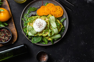 Zucchini waffles with poached egg