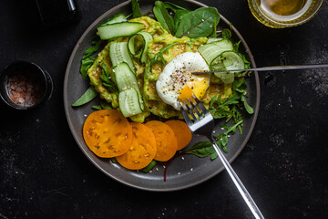 Zucchini waffles with poached egg