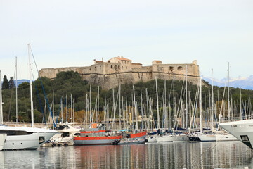 gorgeous panorama view on castle on mountains with boats in the harbor France, Antibes