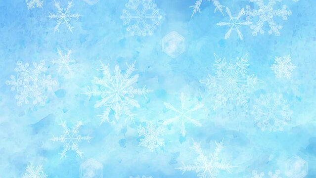 雪の結晶が回りながら舞い降りるファンタジックなループアニメーション。青い背景の色が美しく移り変わっていく。