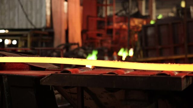 Wire production, Facility operations, Industrial output. Production plant for metal smelting, wire making, molten copper wire assembly line, products derived from blast furnace.
