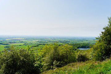 Obraz premium Watching a veil of fog creep across North Yorkshire from Sutton Bank.