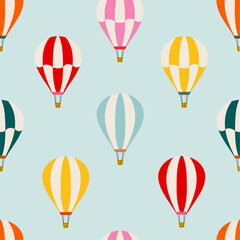 Bright seamless pattern with hot air balloons. Hand drawn balloon in the sky. Cute baby background. Funny decor for nursery, textiles, clothing, packaging, interior.