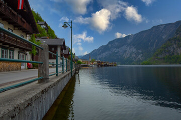 Local view of Hallstatt and the protestant church at sunrise, reflected in the lake Hallstatt, Salzkammergut, Dachstein region, Upper Austria, Austria, Europe