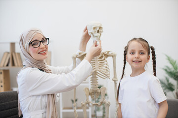 Arabian GP playing with skull while kid staying in hospital