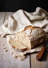 Fresh fragrant crusty bread on a wooden table with a dark background. Generative AI.