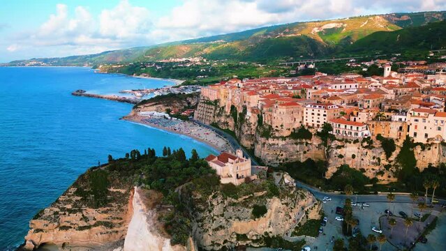 Aerial view of Famous Italian town Tropea: Colorful Houses and Turquoise Waters Along Italy's Picturesque Coast	