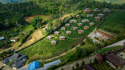 Fototapeta na wymiar beautiful scenery landscape of Ban Rak Thai village chinese hotel and resort is the famous tourist attraction and landmark in the rain season northern of Mae Hong Son, Thailand,