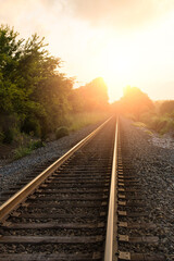 Fototapeta premium Railroad Tracks to the Sun 