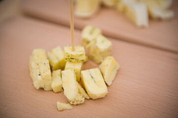 Hard Cheese Festival. Cheese in the market. Homemade cheese. Craft cheese. Milk product. Cheese tasting.