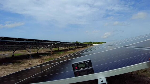 Placing Digital Protractor Level Inclinometer On Photovoltaic Cell To Measure Tilt Angle At Solar Power Plant In Jambur, Gambia. closeup