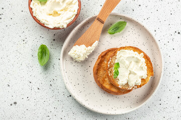 bread with cream cheese on a light background. Detox and clean diet concept. place for text, top view