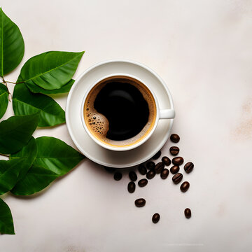 Top-View Coffee Delight Cup of Black Coffee, Green Leaves, and Beans on a Light Background