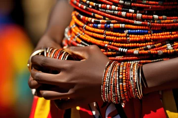 Poster A dramatic portrait of a Maasai woman with beaded accessories and traditional clothing © STORYTELLER