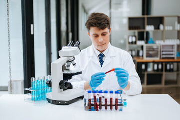Modern medical research laboratory. female scientist working with micro pipettes analyzing...