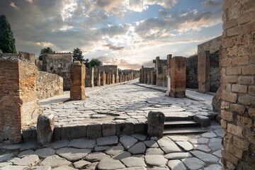 Famous ancient city of Pompeii (Scavi di Pompei) near Naples. Footpath road and ruins in ancient Pompeii, Campania, Italy