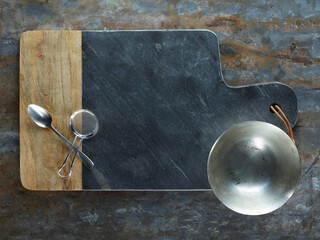 Marble cutting board on metallic rustic background