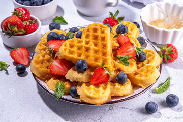 Breakfast belgian waffles with berry