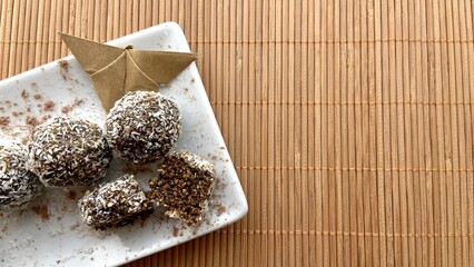 vegan chocolates with nuts, chocolate, honey and coconut