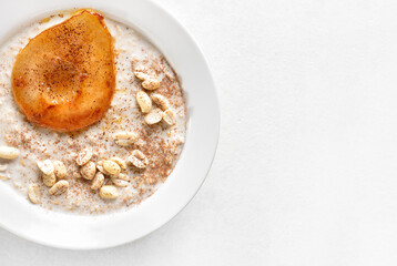 Oat porridge with caramelized pear and peanut