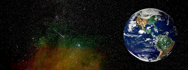 Obraz na płótnie Canvas Earth on a colorful sky with stars and copyspace.Elements of this image furnished by NASA