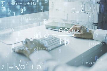 Double exposure of creative scientific formula concept with hands typing on laptop on background,...