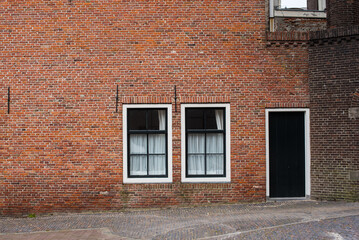 old brick building with windows