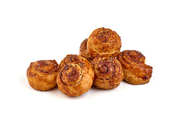 Sweet cinnamon rolls, close-up, isolated on white background.