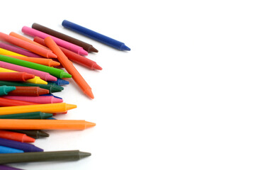 Fototapeta premium Crayons lined up isolated on white background.
