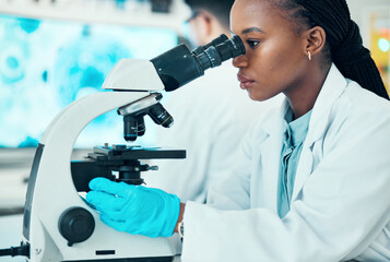 Microscope, research and female scientist in a laboratory for a medical or pharmaceutical study....