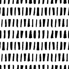 Vertical bold brush strokes seamless pattern. Hand drawn abstract geometric decorative background. Vertical black wide brush strokes and vector thick stripes in a row. Modern vector design.