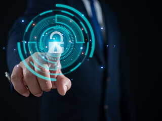 Businessman finger pressing on virtual key. Represents protection from outside hacking. The concept...