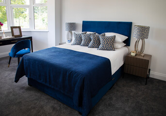 Modern bedroom, cosy room with blue bed