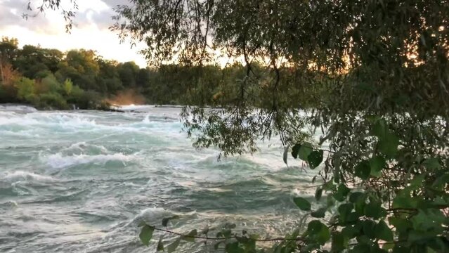 Powerful river current preceding the waterfall