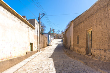 Fototapeta na wymiar STONE STREET IN AN OLD TOWN IN NORTH ARGENTINE. SANTA CATALINA, JUJUY.