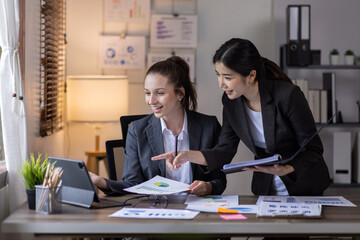 Teamwork asian business woman and Profession businesswomen, accounting concept, doing planning analyzing the financial report, business plan investment, finance analysis financial in office
