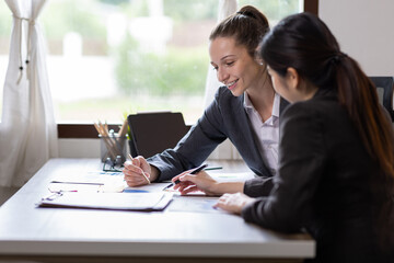 Teamwork asian business woman and Profession businesswomen, accounting concept, doing planning analyzing the financial report, business plan investment, finance analysis financial in office
