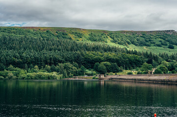 Fototapeta premium Ladybower Reservoir Dam, large Y-shaped reservoir in the Upper Derwent Valley, at the heart of the Peak District National Park, Derbyshire, England, UK
