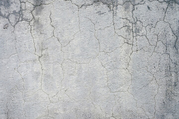 Texture of old wall. Cracks in grey color wall