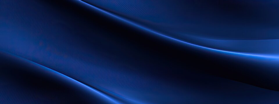 Navy blue silk satin. Dark elegant luxury abstract background with space for design. Shiny smooth fabric. Soft folds. Drapery. Color gradient. Lines. Wavy pattern. Christmas, birthday, romance.