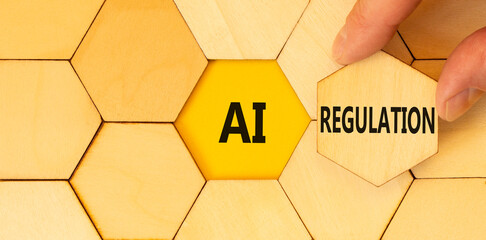 AI regulation symbol. Concept words AI artificial intelligence regulation on beautiful wooden...